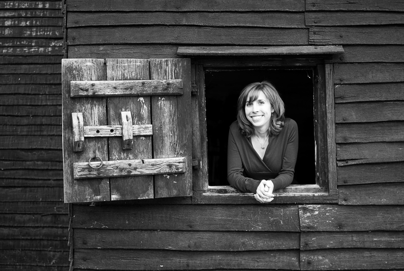 girl in window at claude moore colonial farm in mclean, va