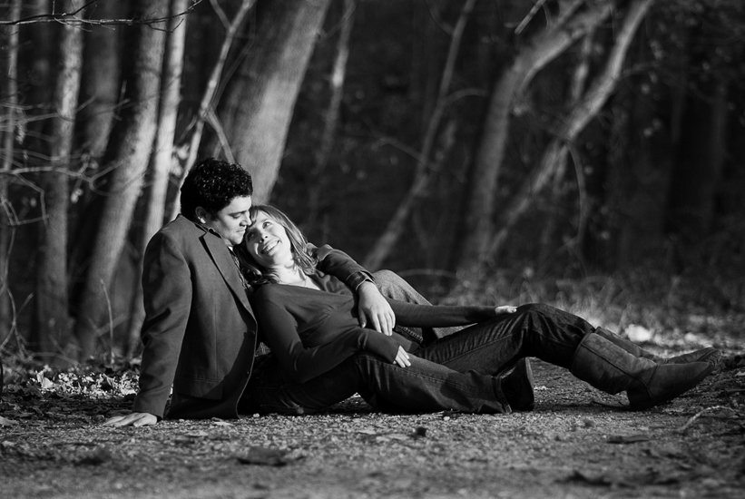 couple sitting on path - black and white - in northern virginia