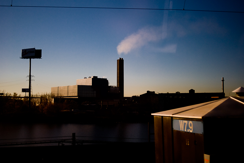 blue sky black foreground smoke stack on the way to washington dc