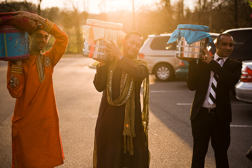 family gathers gifts at hindu engagement ceremony