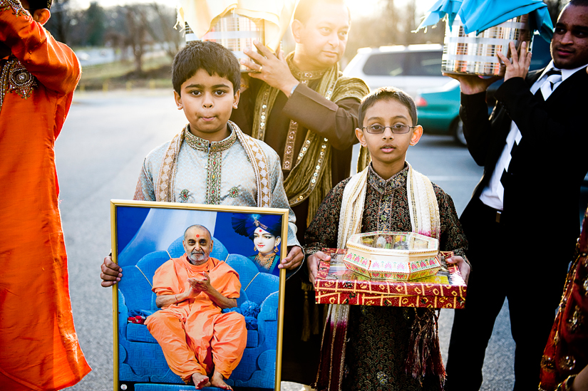 family gathers gifts at hindu engagement ceremony