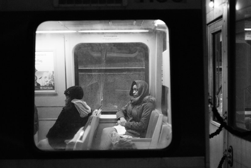 lady looking bored on the train