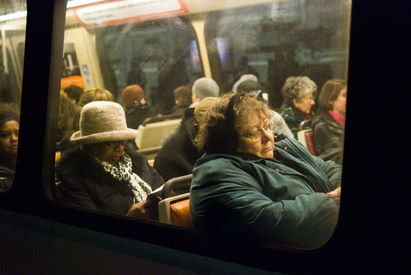 lady sleeping on the dc metro