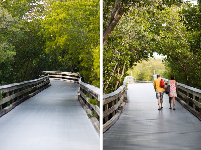 couple walking on boardwalk