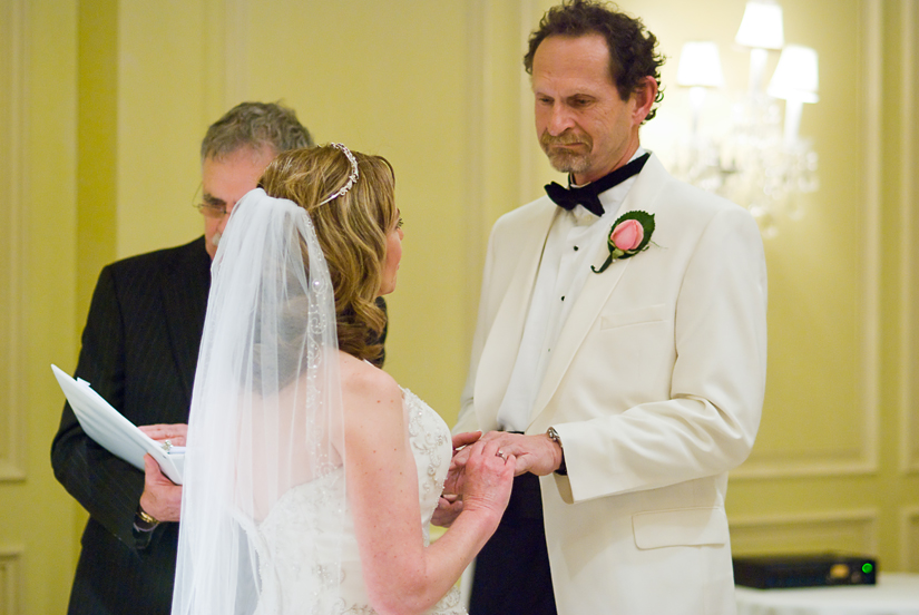 groom looking at bride