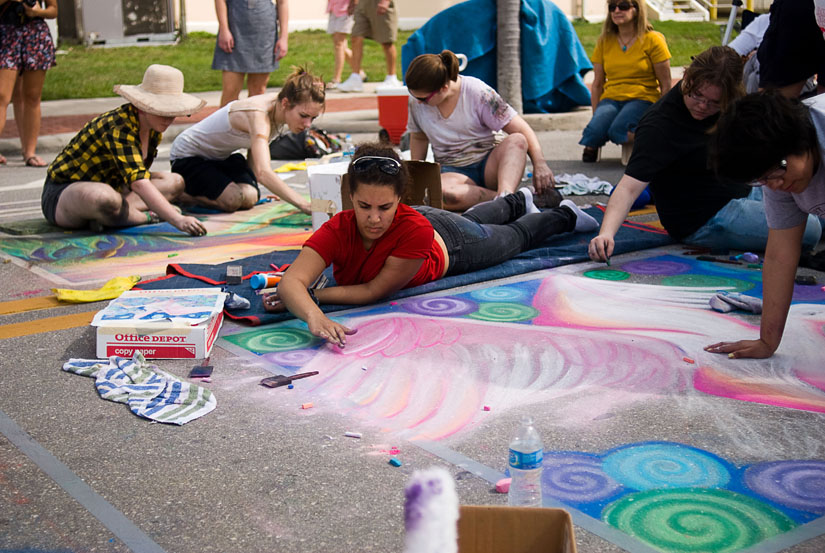 girl doing a chalk drawing