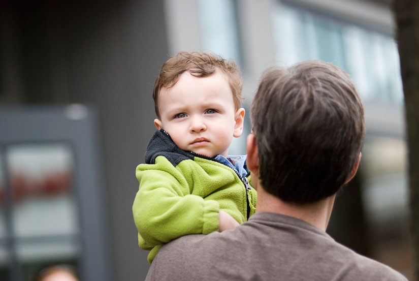 little boy at the parade in old town alexandria