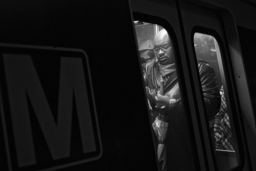 guy on the train at l'enfant plaza in washington, dc