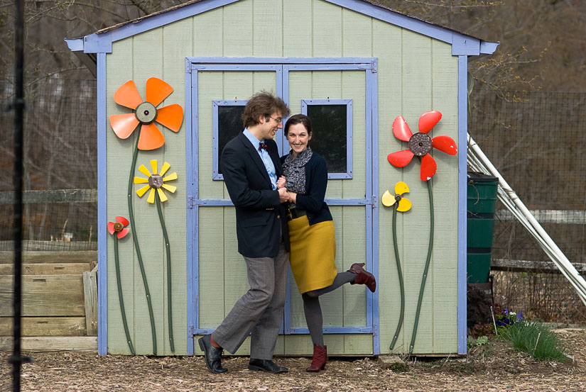 couple in front of a garden