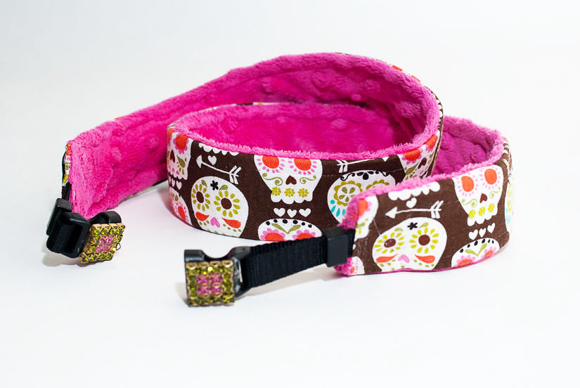 pink camera strap with skulls