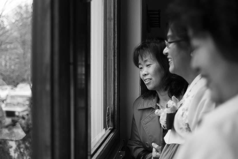 relatives watching on during the formal wedding portraits