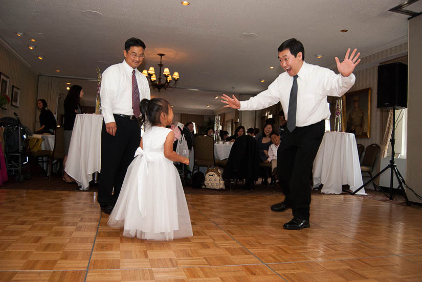 flower girl and father dancing at the capitol hill club