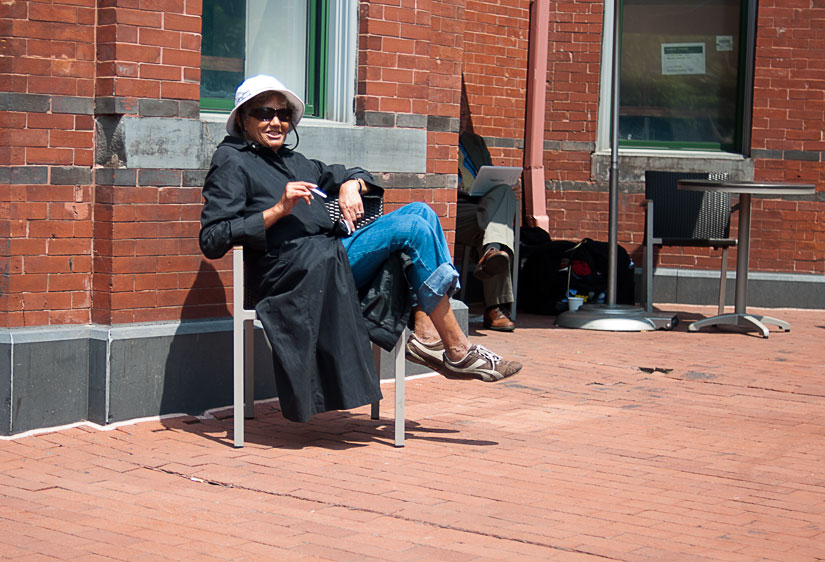 lady in a chair - street photography