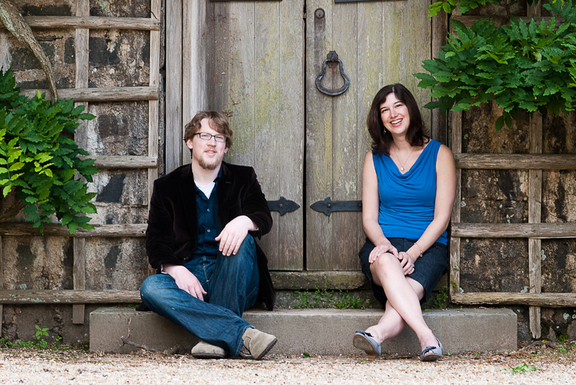 wooden door engaged couple