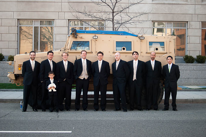 groom and groomsmen in front of a tank in washington, dc