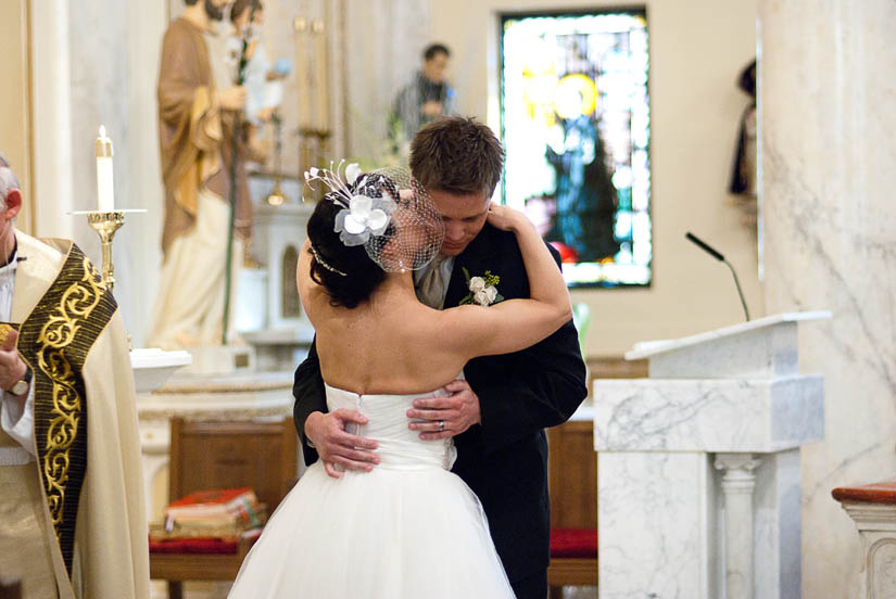 bride and groom at Holy Rosary Church in Washington, DC