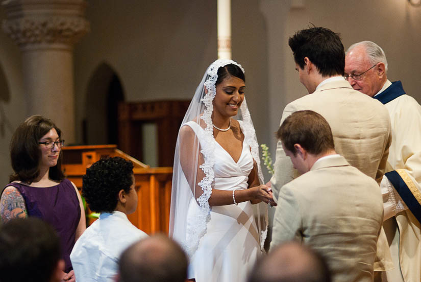 bride and groom in ceremony at dahlgren chapel