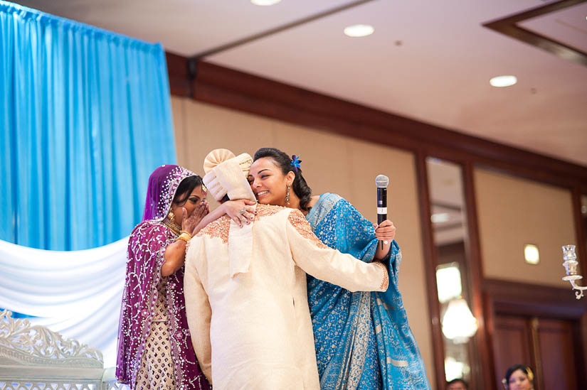 hugging after speeches at wedding ceremony