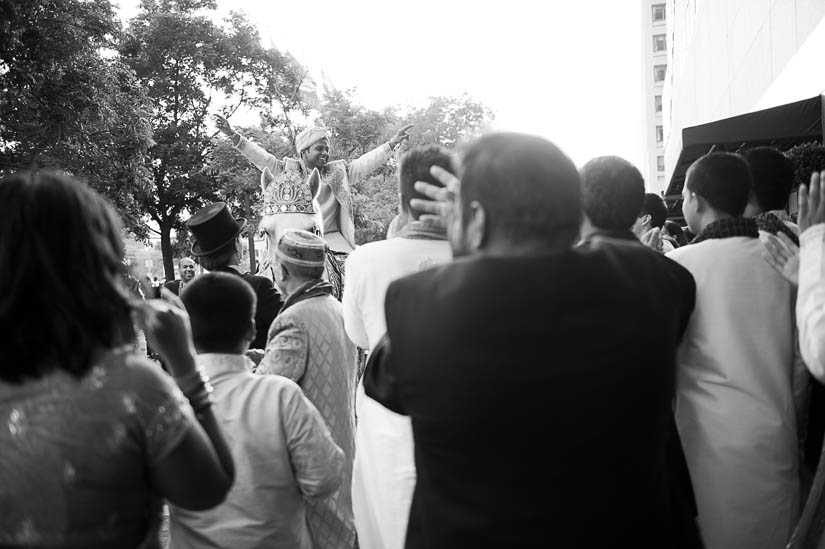 bengali groom surrounded by crowd