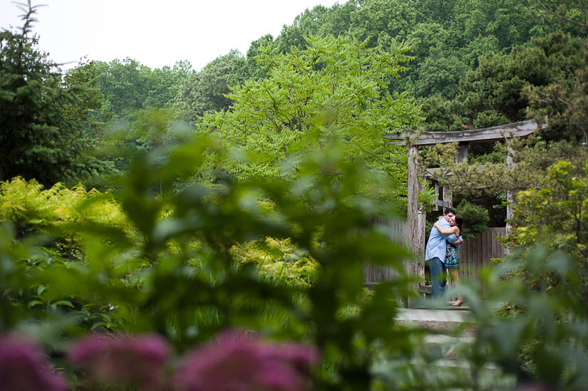 engaged couple at a japanese pagoda in brookside gardens