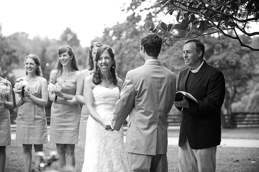 bride laughing during her wedding ceremony