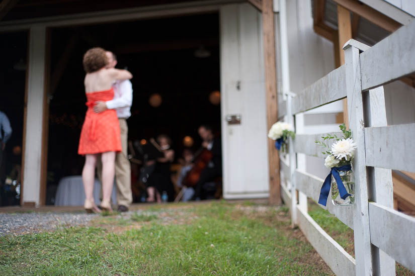 wedding details and couple kissing