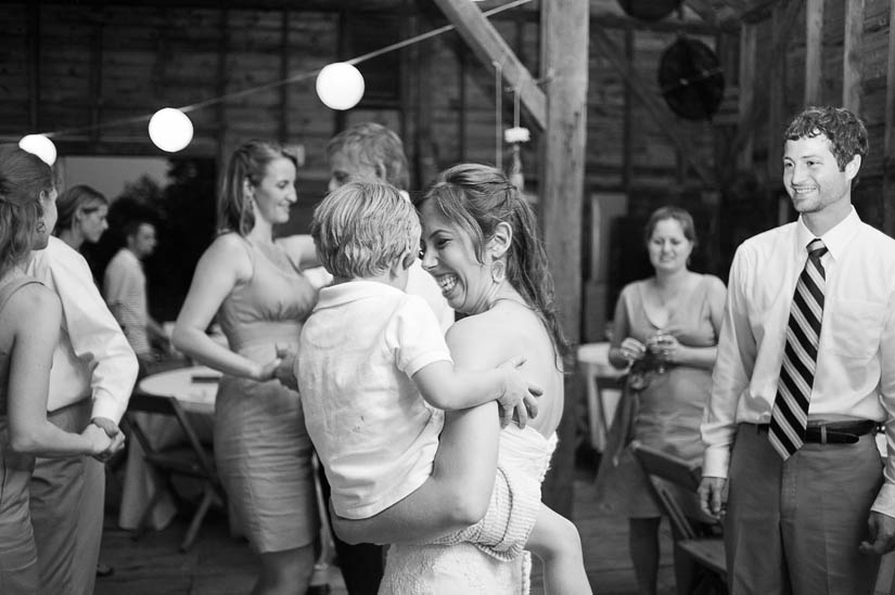 bride dancing with nephew at wedding reception