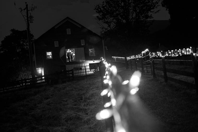 rodes farm stables at night in black and white