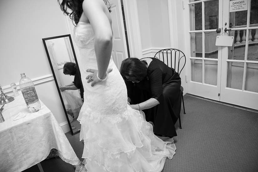 mother of the bride bustling the dress