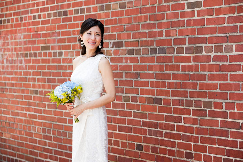 gorgeous bride with red brick backdrop