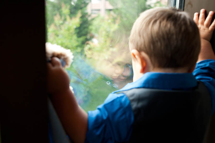 little boy reflected at hampton inn wedding, national harbor