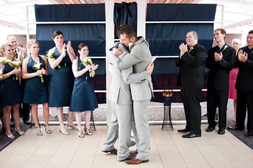 hugging during wedding ceremony on boat