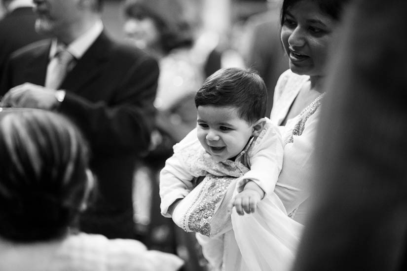 baby laughing at wedding reception