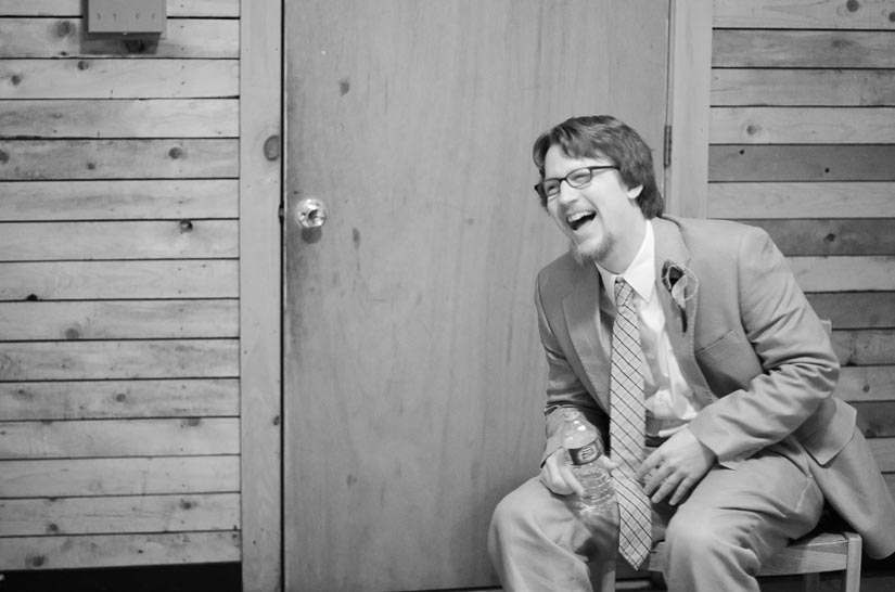 groom laughing in cabin