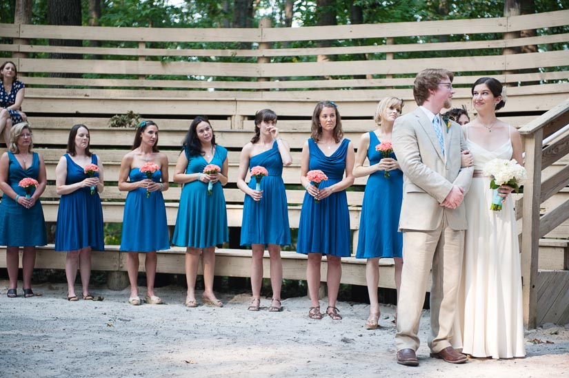 bride and groom and bridesmaids with blue dresses