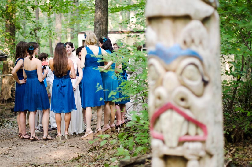 bridal party with totem pole