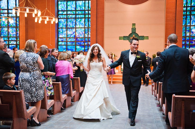 walking down the aisle after wedding ceremony