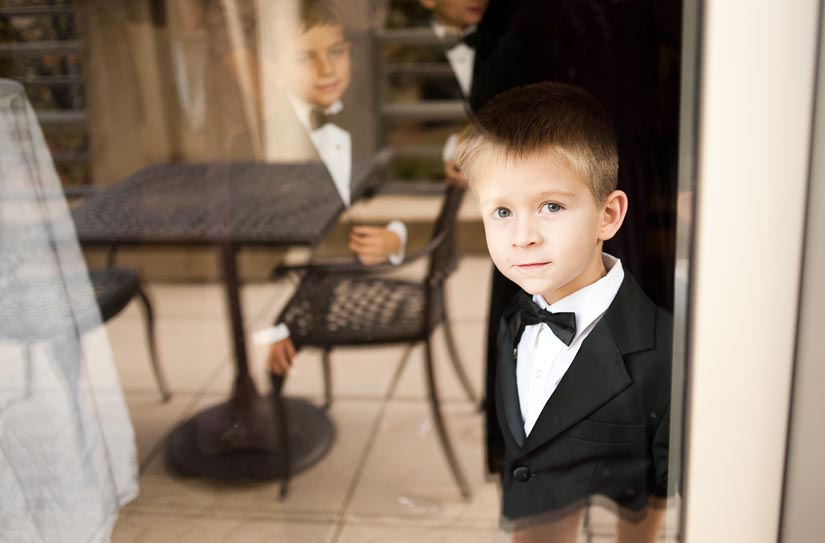 little kid with window reflections