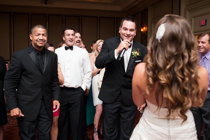 groom singing to his bride