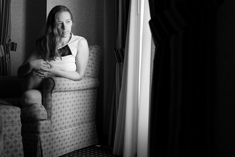 black and white self-portrait in a hotel