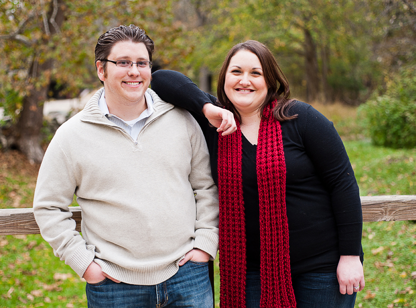 happy couple with red scarf at great falls, va