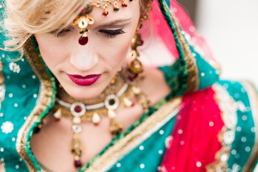 gorgeous red and green sari on bride