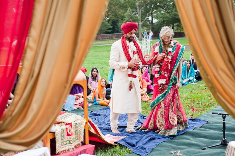 circling the holy book at sikh wedding ceremony