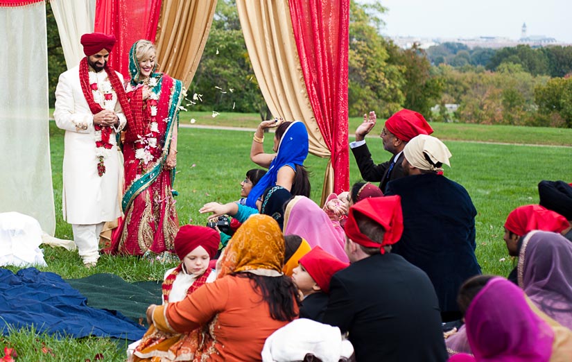 flowers being thrown at end of sikh ceremony at netherlands carillon