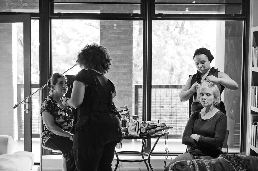 mothers getting ready before wedding ceremony