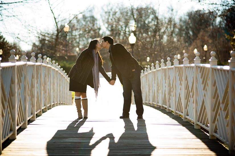 kissing on a bridge at quiet waters park