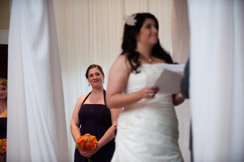 bridesmaid tears up during the ceremony