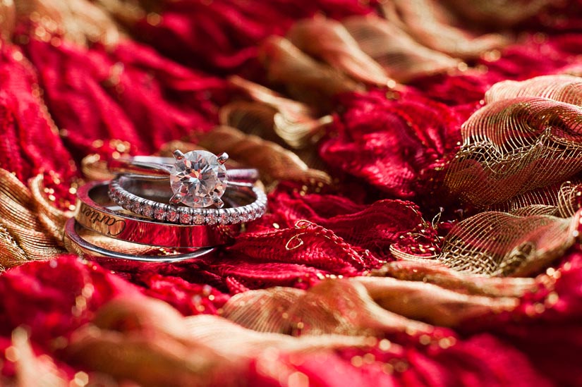 20111022_megan-pritpal-wedding_1133 ring shot on indian scarf