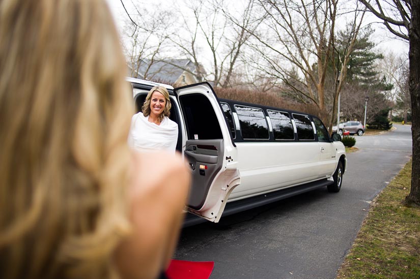 bride in front of a hummer limo