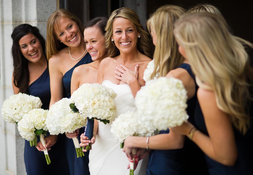 bridal party with white bouquets